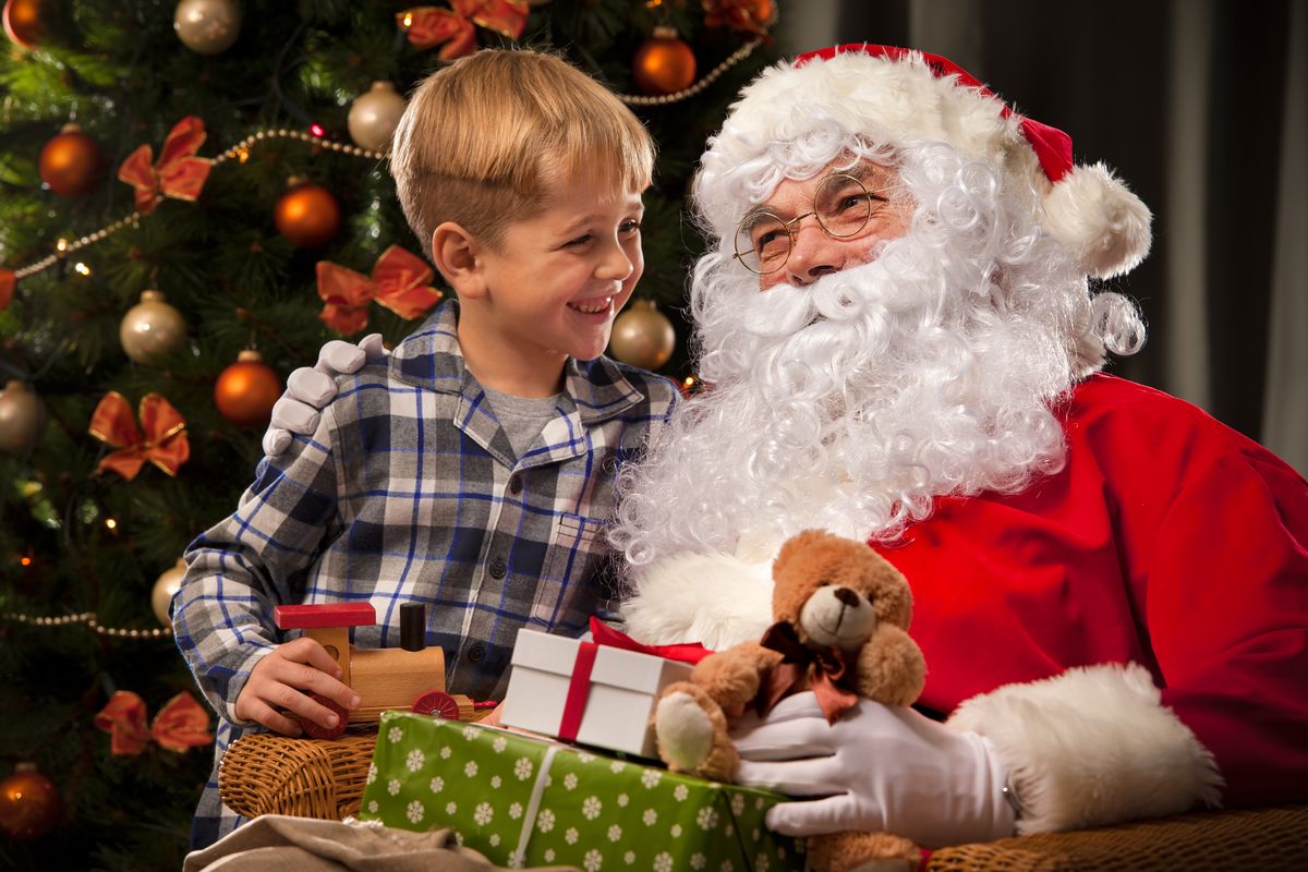 Santa Claus and a little boy